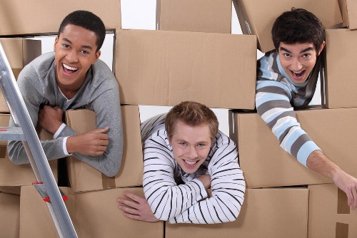 Professional movers loading furniture for a Northwood relocation